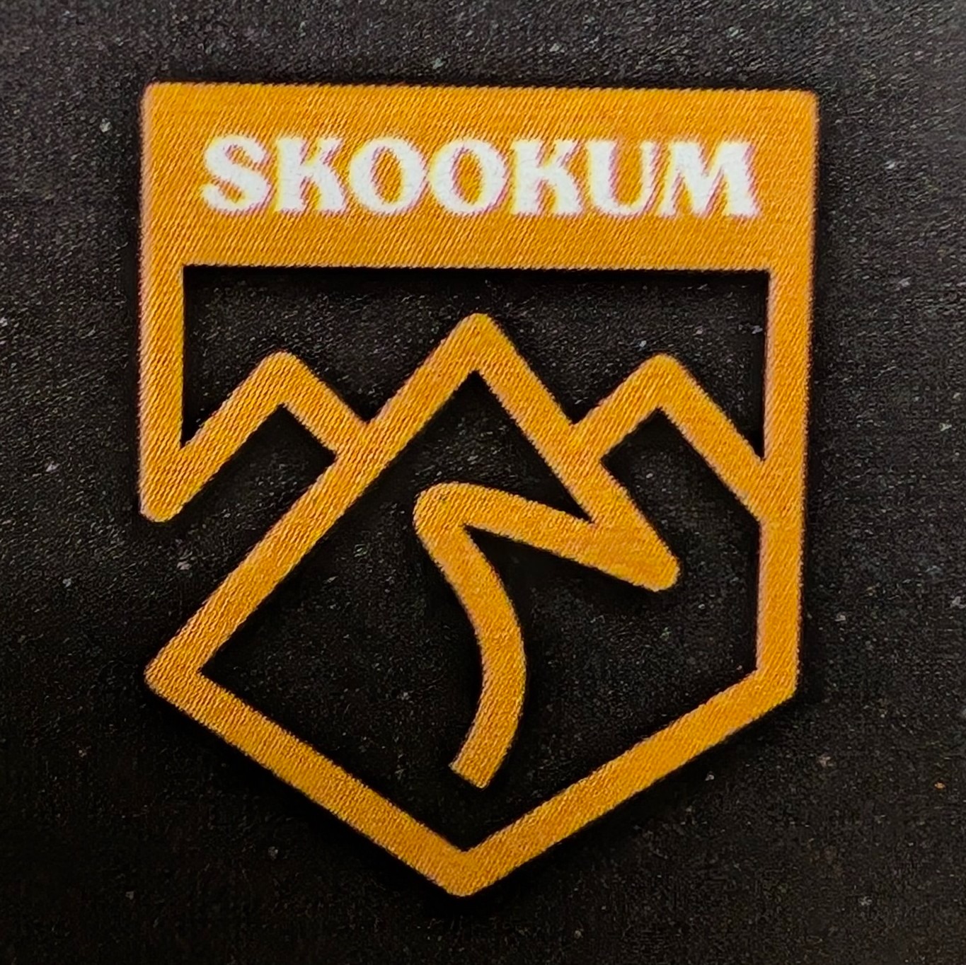 Skookum Bike and Ski logo