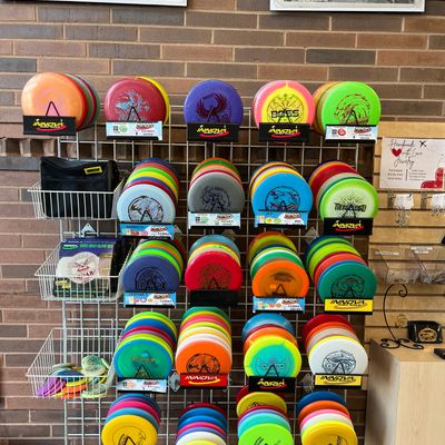 Gift shop has a great selection of innova discs. I saw glow, DX, champion, star and halo for max $18