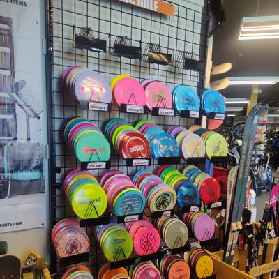 One of two large sections! New Discraft, MVP, Axiom, Dynamic, Westside, Latitude 64, and Innova. Also, large used budget disc bin.