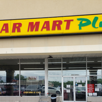Dollar Mart Plus logo